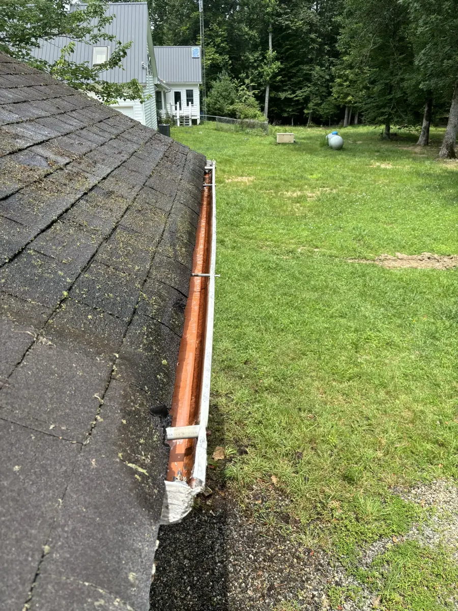 Gutters sparkling clean after professional pressure washing